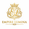 A gold ornate monogram crest with a crown above stylized letters, above the words EMPIRE LUMINA on a white background.