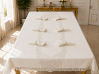 Empire Lumina 26-piece 100% Turkish linen tablecloth set with lace runner, 12 embroidered napkins, and 12 matching napkin rings, elegantly displayed in a luxury dining room.