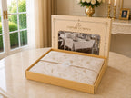 Empire Lumina luxury 26-piece Turkish linen tablecloth set presented in its premium gift box with elegant floral tissue paper packaging.