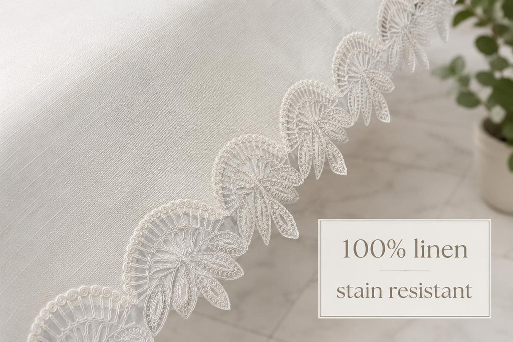Luxury off-white 100% Turkish linen stain-resistant tablecloth with elegant embroidered lace trim, showcasing the premium fabric texture and protective finish.