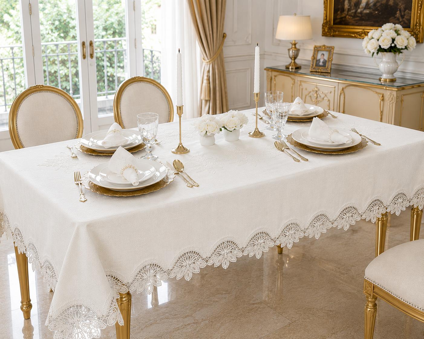 Luxury stain-resistant Turkish linen tablecloth set in off-white, elegantly styled on a gold dining table with white dinnerware in a sophisticated luxury dining room.